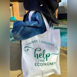 New “Helping the Economy” white shopping tote! Glittered lettering, 100% cotton.